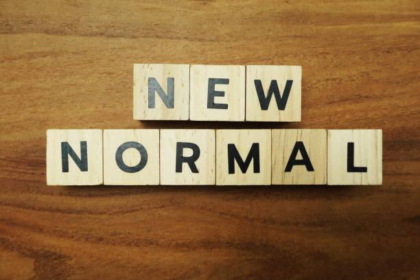 istock New Normal alphabet letters on wooden background 1268633781