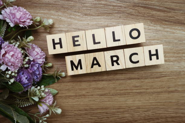 istock Hello March alphabet letters on wooden background 1268634604