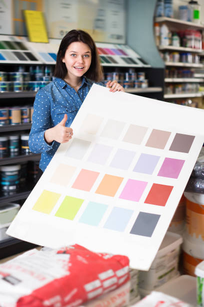 Positive woman checking color scheme