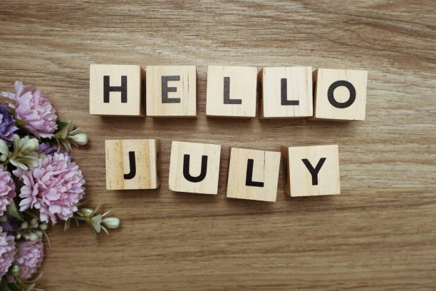 istock Hello July alphabet letters on wooden background 1268634649