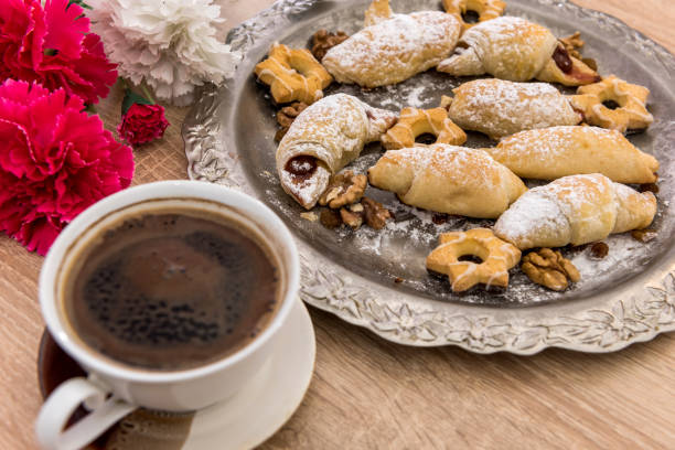 istock delicious homemade cakes sprinkled icing with coffee on the table for breakfast 1268634717