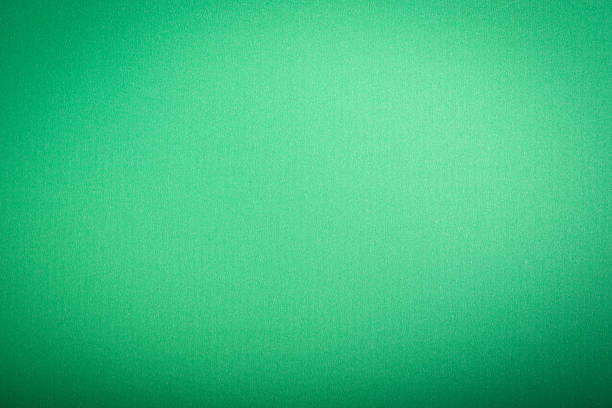 istock green texture fabric  Grain texture art paper in a high resolution. Art background. 1268649393