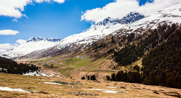 istock mountain landscape with snow, switzerland engadine 1268650415