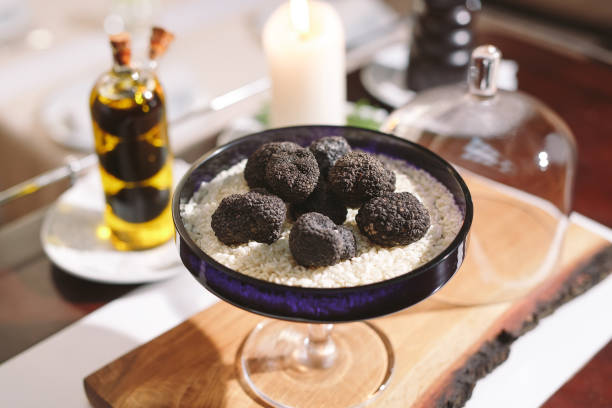 Black truffle mushroom on the rice Black Truffles on the table.