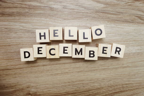 istock Hello December alphabet letters on wooden background 1268656449