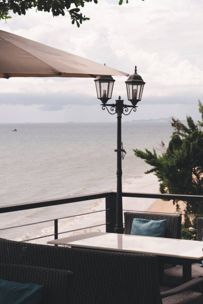istock Table and chair in restaurant with sea view. 1268657267