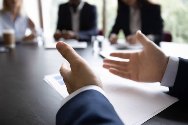 istock Business coach teaching group of people successful case management 1268659484