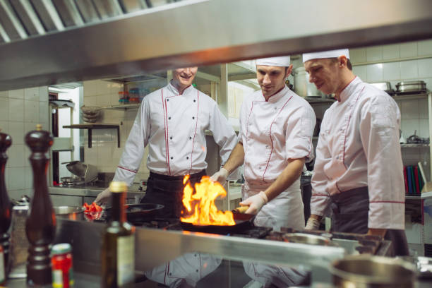 istock Fire in the kitchen. Fire gas burn is cooking on iron pan,stir fire very hot 1268661382