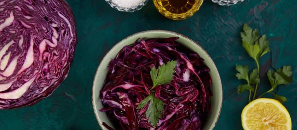istock Banner of Shredded red cabbage in bowl. 1268661491