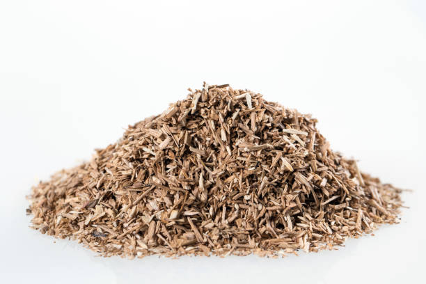 istock Pile of wood smoking chips isolated on white. 1268662451