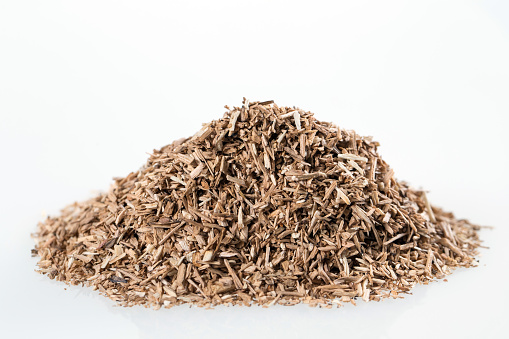 Pile of wood smoking chips isolated on white
