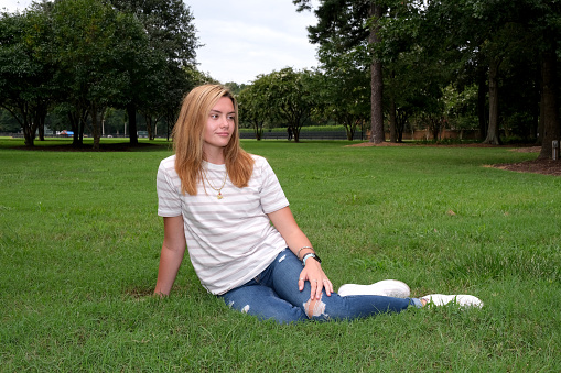 Teenage girl on school grounds.