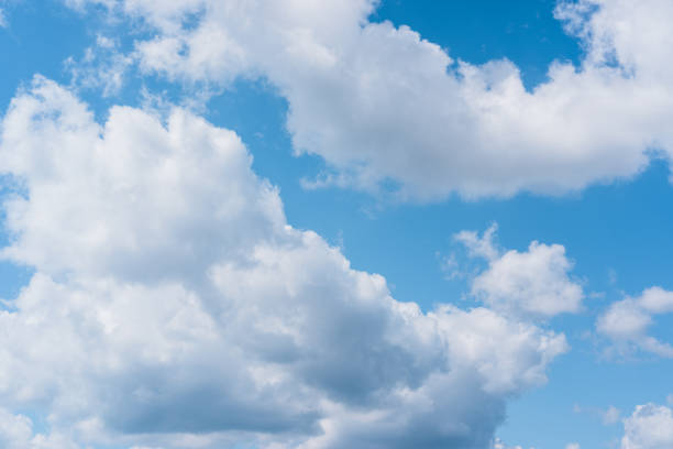 Blue sky and white clouds. Clear clear sky, good weather. Blue sky and white Cumulus clouds. Clear clear sky, good weather. screen saver photos stock pictures, royalty-free photos & images