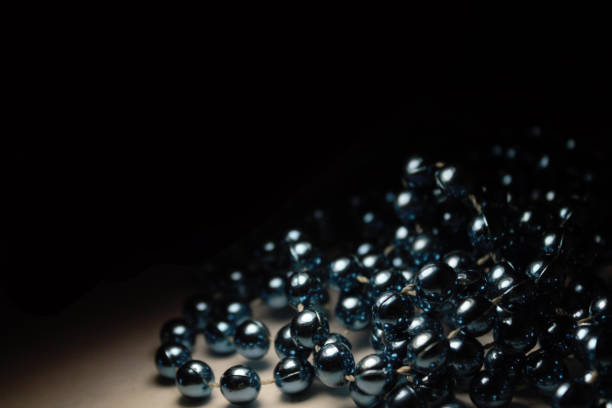 istock beads on a black background. plenty of space for text 1268671313