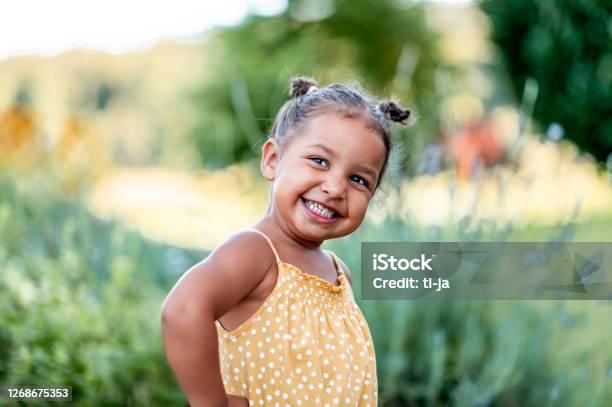 Portrait Of Cute Little Girl Outdoors Stock Photo - Download Image Now - Child, Smiling, Happiness