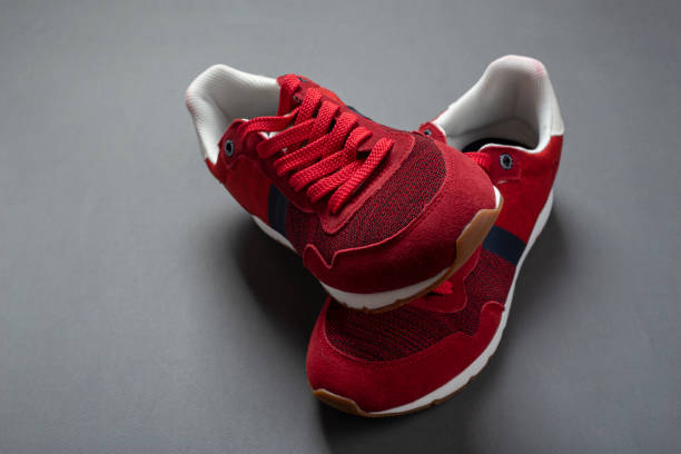 istock Pair of stylish red sneakers 1268680320