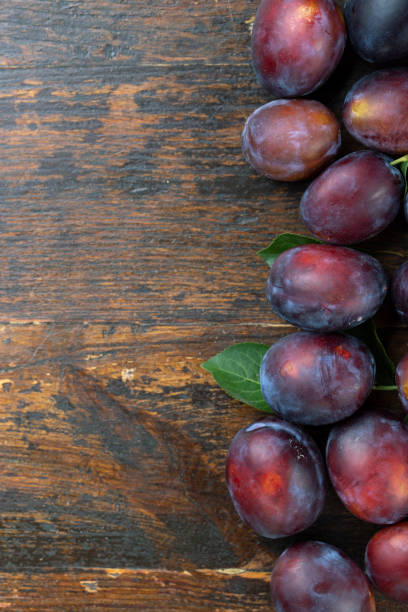 istock Fresh plum. Harvesting. Delicious fruits. 1268680969