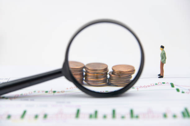 istock There are magnifiers and currency on the business chart 1268681830
