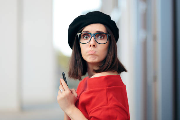 istock Surprised Fashion Woman Reading a Text Message 1268683042