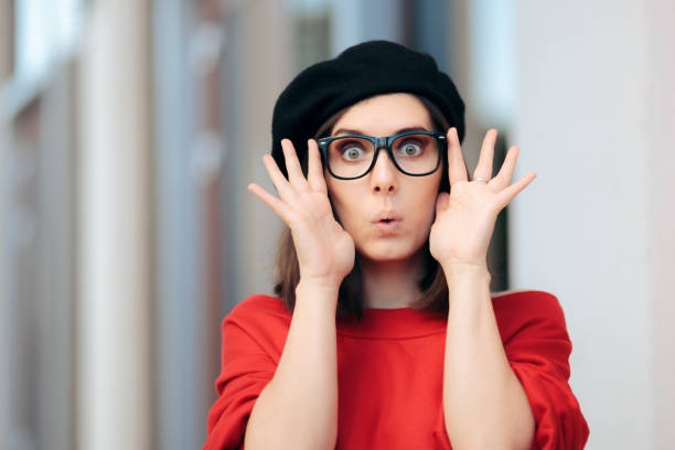 istock Surprised Woman Wearing Glasses and a French Beret 1268683065