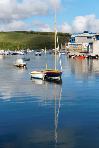 View of Batson Creek with wooden boats on the water Salcombe / UK - AUG 18, 2020: View of Batson Creek with wooden boats on the water. sailboat mast stock pictures, royalty-free photos & images