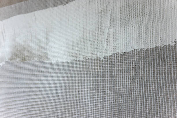 istock putty powder on the wall with nylon mesh net 1268688671