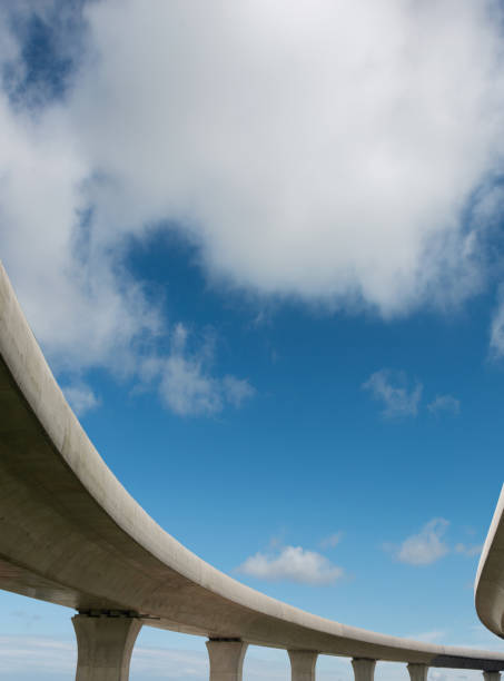 istock Clear sky, highway pavement under the overpass 1268688994