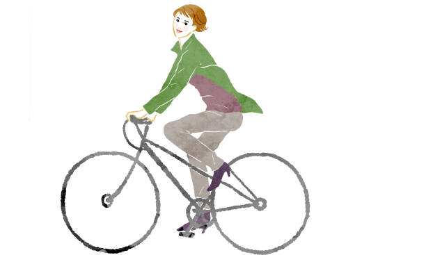 istock Illustration of a woman riding a bicycle 1268689818