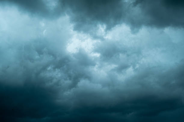 istock Dark cloudy sky before thunderstorm panoramic background. Storm heaven panorama. Wide gloomy backdrop 1268690312
