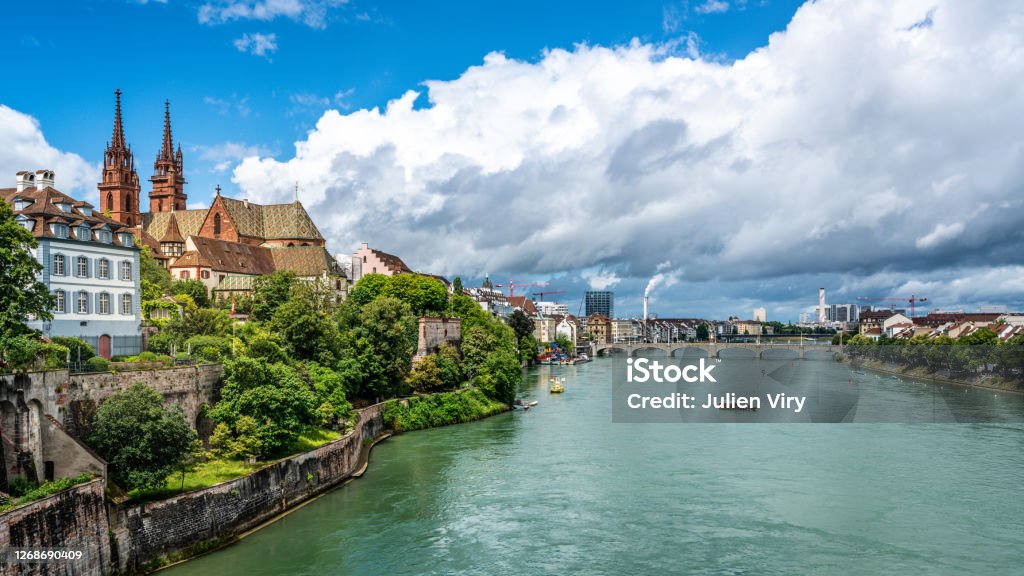 Basel panoramic cityscape with Rhine river view colourful old town and industrial buildings in the distance in Basel Switzerland Basel - Switzerland Stock Photo