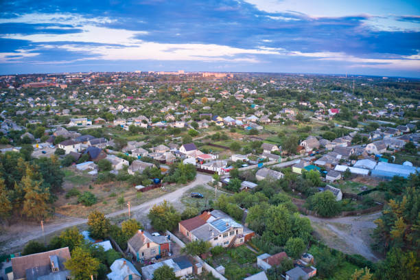 istock Flying over the evening beautiful modern city 1268691683
