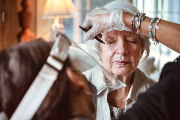 istock Senior woman having makeup 1268693041