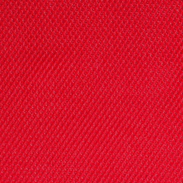 Polyester sandwich mesh texture in red Polyester sandwich mesh texture in red jersey fabric photos stock pictures, royalty-free photos & images