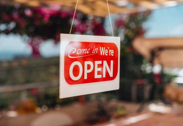 istock Come in We’re Open Sign on the Window 1268698192