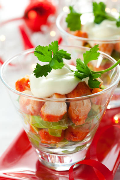 istock Crab salad with avocado in two glasses 1268700128