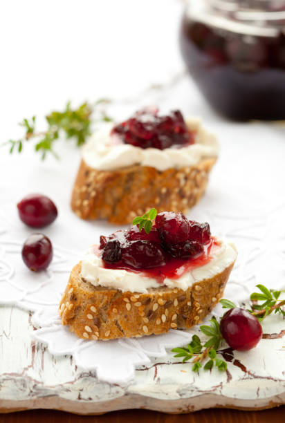 istock Sweet cranberry jam on toast 1268700164