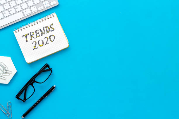 istock Social media trends concept with laptop. Office workplace flat lay 1268700727