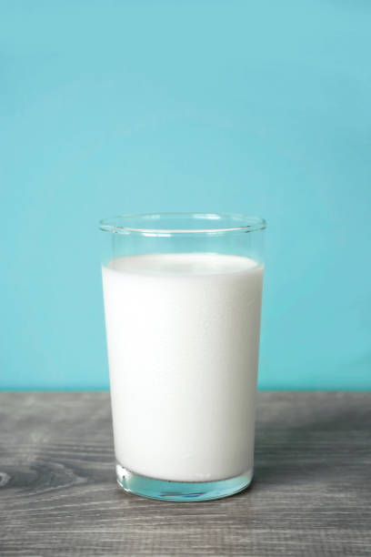A glass of milk on the table.