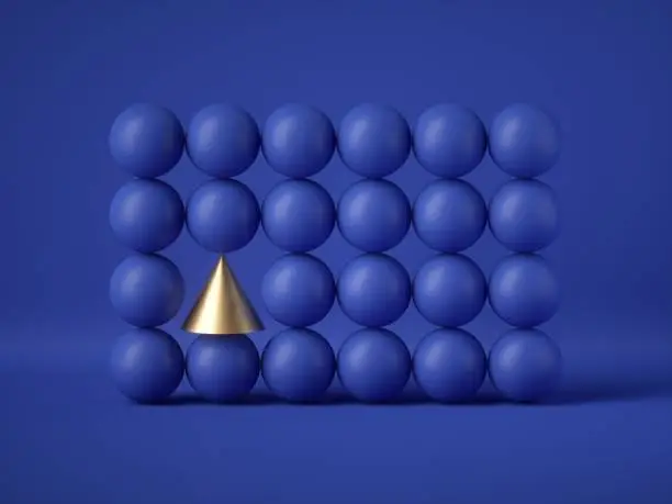 3d render, abstract geometric design: gold cone amongst blue balls isolated on blue background. Balance, gravity, one of a kind exception or mismatch concept. Matrix of primitive shapes