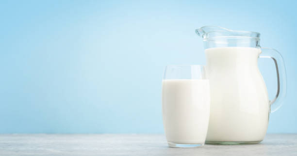 istock Milk jug and glass 1268710464