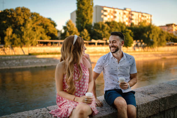 istock Happy young couple having fun outdoors 1268712430