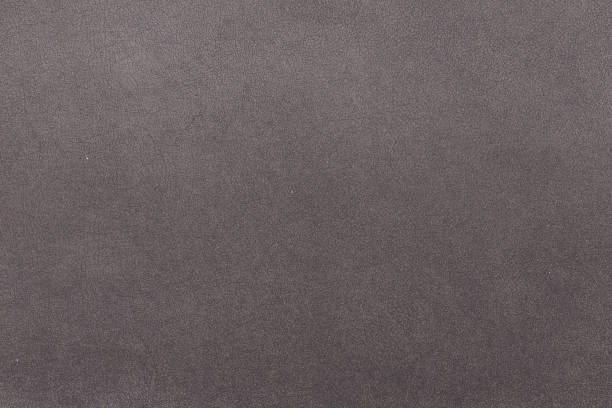 istock Blacka paper texture cardboard background close-up. Grunge old paper surface texture 1268713304