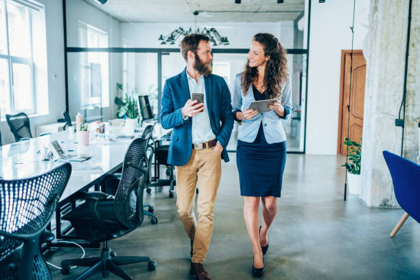 istock Business conversation in the office. 1268719013