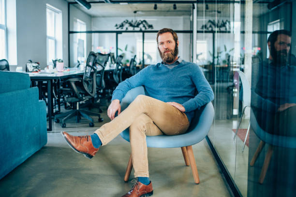 istock Successful businessman in the office. 1268719250