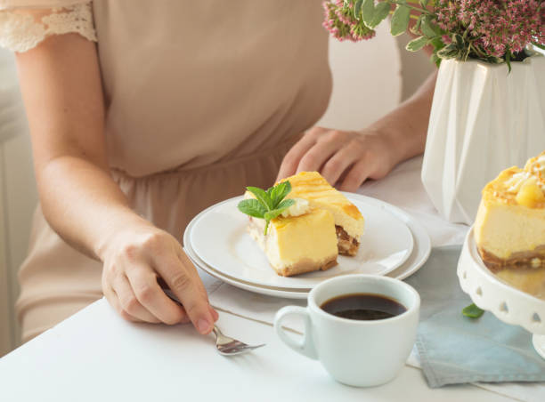 istock Caramel apple pear cheesecake. Close up side view stone kitchen table, side view. Autumn dessert. 1268720960