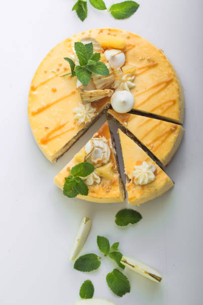 istock Caramel apple pear cheesecake. Close up side view stone kitchen table, side view. Autumn dessert. 1268720982