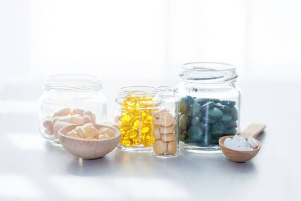 istock Vitamins, supplements, healthy life concept. 1268721066