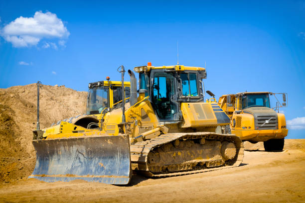 istock Road construction machinery on a highway construction site 1268724359