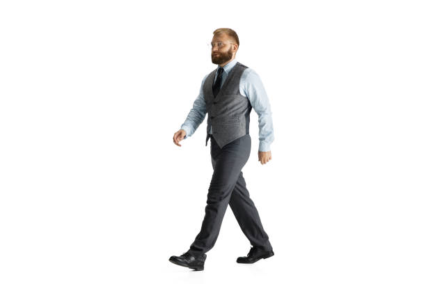 istock Cheerful handsome businessman isolated over white studio background 1268725253