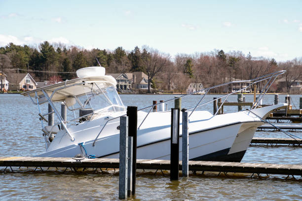 istock white catamaran boat sinking in marina 1268733300